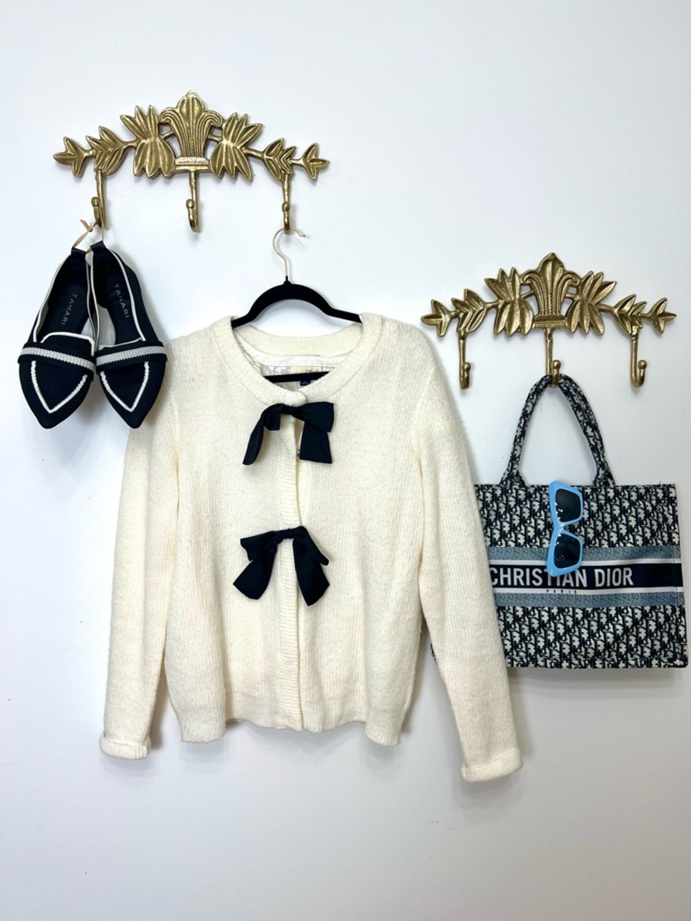 Spring chic Cream Knit Cardigan with Black Bow Accents M ptp 22”